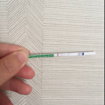 舒服。晚上睡觉燥热。第十天测了下试纸,隐约