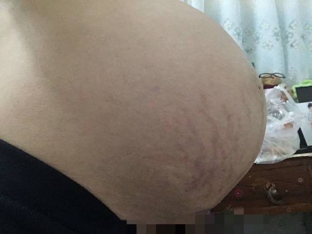 大家会看的,帮忙看一下_怀孕9个月,看看肚型是